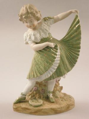 A German Bisque porcelain figure of a young girl dancer