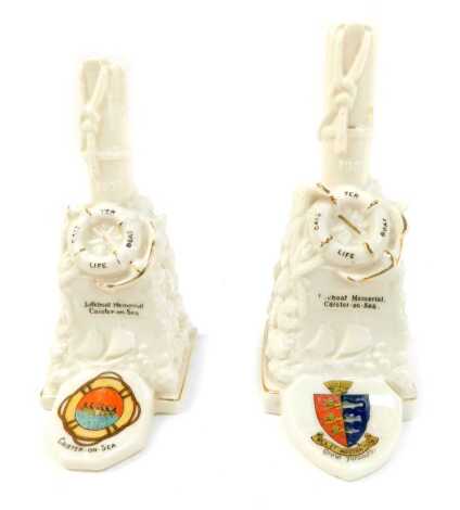 Two crested ware lifeboat memorials, for Caister on Sea, 15.5cm high and 17cm high. (2)