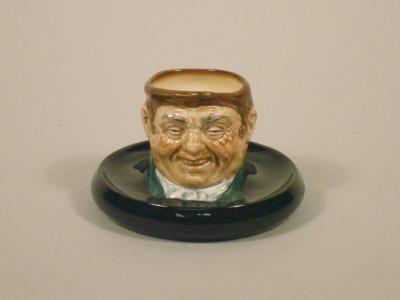 A Royal Doulton match holder