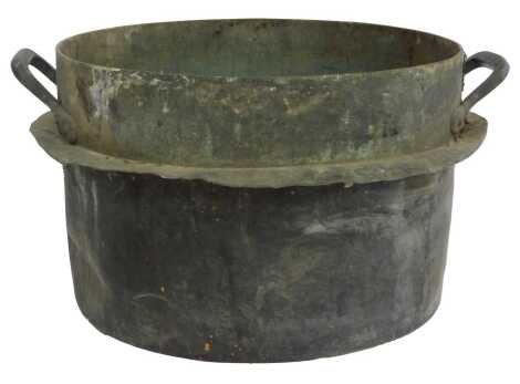 A 19thC French copper twin handled cooking or jam pot, 63cm wide.