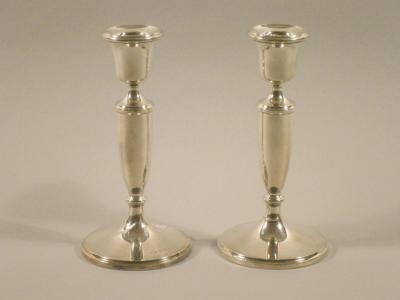 A pair of silver candlesticks