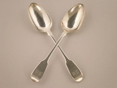 A pair of George III silver Fiddle pattern dessert spoons