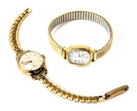 Two lady's wristwatches, comprising a Tissot lady's wristwatch, with rectangular dial, in gold plated case on expanding strap, boxed, and a Rhone 7 gold plated and stainless steel cased lady's wristwatch, boxed. (2)