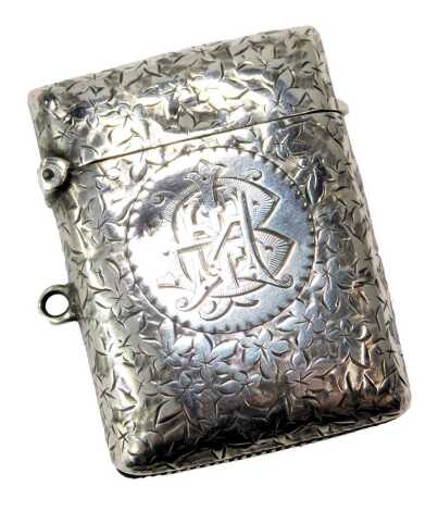 A Victorian silver Vesta, bright cut decorated with leaves, initial engraved, Birmingham 1896, 0.82oz.