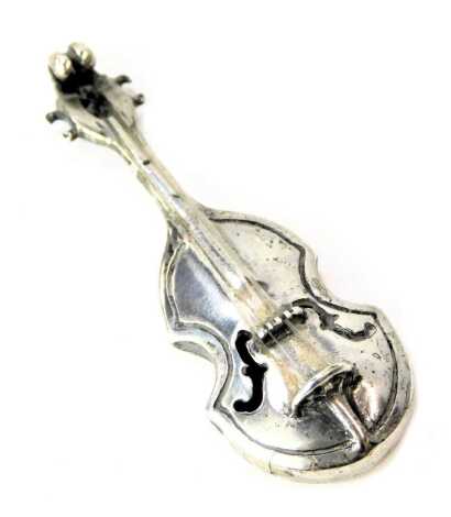 A white metal model of a cello, stamped 925, 0.37oz, 5cm high.