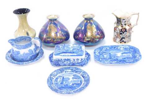 A group of ceramics, comprising two Devon Fieldings lustre vases, 14cm high, (AF), a Caithness glass vase, 17.5cm high, a Masons Applique pattern ironstone jug, and a group of Copeland Spode Italian pattern blue and white wares. (a quantity)