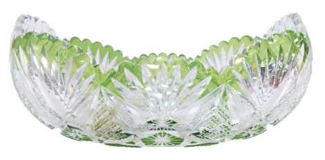 A 20thC cut green flash glass bowl, of oval form, 37cm wide.