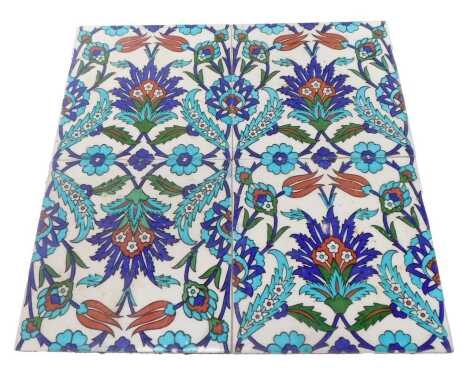 Four 20thC Turkish Iznik style ceramic tiles, each decorated with flowers, 20cm x 20cm.