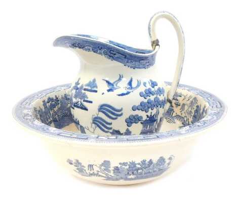 A Wedgwood pottery wash jug and bowl, decorated in the Willow pattern, printed marks, 34cm diameter. (AF)