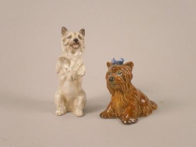 Two porcelain dog ornaments