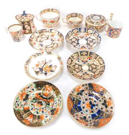 A group of 19thC Derby porcelain, to include coffee cup and saucers, tea cups and saucers, trinket dish and cover of waisted form, 11cm high, etc. (AF) (1 tray)