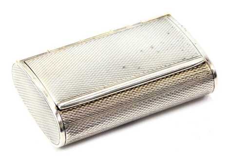 An Elizabeth II silver pill box, with engine turned decoration, maker JC Limited, Birmingham 1990, 1.35oz.