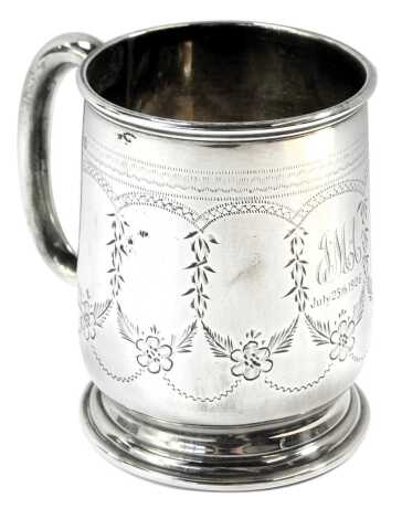 A George V silver christening cup, with embossed floral decoration, bearing initials J M A, July 25th 1926, Birmingham 1926, 2.32oz,