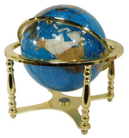 A stone set terrestrial globe, in cradle, 41cm high.