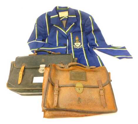 A University of Manchester vintage blazer, by J Wippell and Company Limited, 24 King's Street Manchester, together with a black briefcase, embossed with the crown and cypher of Queen Elizabeth II, and a brown leather briefcase bearing the crown and cypher