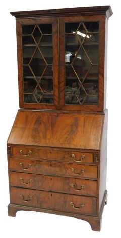 A 19thC mahogany bureau bookcase, the out swept pediment over a pair of astragal glazed doors enclosing two shelves, above a fall flap with an arrangement of drawers and recesses, above four long graduated drawers, raised on bracket feet, 205cm high, 93cm