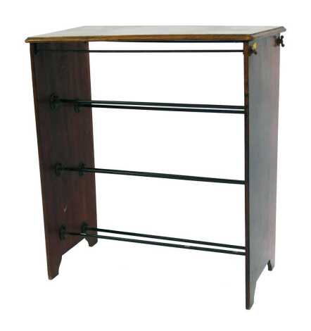 An early 20th walnut shoe rack, with three tiers of metal bars, manufactured by John Watts, Sheffield, England, bearing plaque, 75cm high, 64cm wide, 36cm deep.