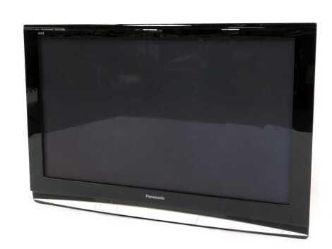 A Panasonic Viera 42" wall mounted television, model number TH-42PZ80BA, with lead and remote.