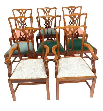 A set of eight Chippendale mahogany dining chairs, with drop-in seats, raised on square legs, comprising a pair of carvers and six chairs. NOTE: The upholstery in this lot does not comply with the 1988 (Fire & Fire Furnishing) Regulations, unless sold to 