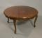 An Edwardian mahogany circular coffee table