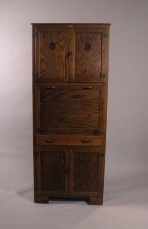 A 1920's oak Maid Saver kitchen cabinet made by Lusty