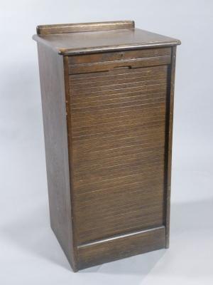 A 1920's/30's oak tambour front filing cabinet