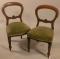 A set of six Victorian balloon back dining chairs