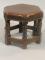 A small hexagonal oak stool