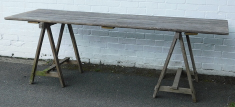 A French six-plank table, with two A-frame supports, 73cm high, 75cm wide, 227cm long.