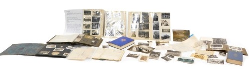 An extensive German WWI & WWII military archive related to an Otto Machledt, (born 1890 Dorston, Germany) to include WWI photographic albums of trenches, scenes within tents, bars, etc., German soldiers and officers in uniform, relating to the 364 regimen