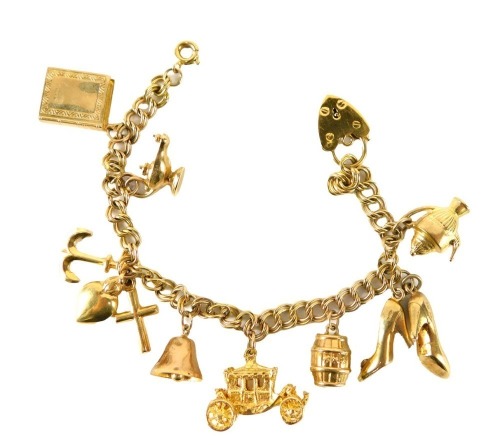 A 9ct gold charm bracelet, set with various charms to include a pair of shoes, barrel, book, anchor, coach, teapot, 20.7g.