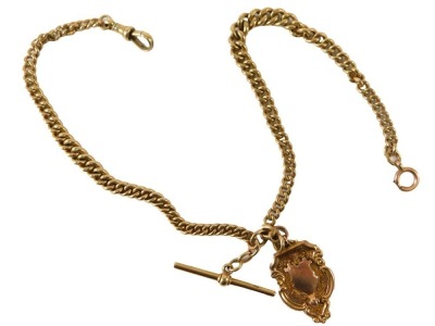 A 9ct gold watch chain, stamped to T bar 375, and a rose coloured gold fob, with vacant cartouche, 40g overall.