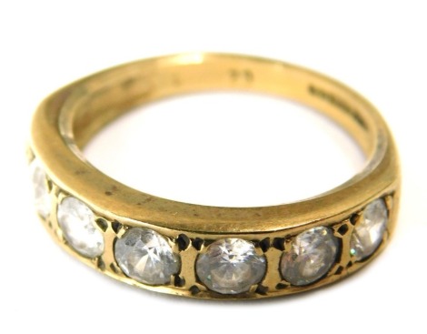 A 9ct gold and CZ dress ring, set with six white stones, ring size M½, 3.4g all in.