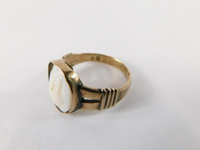 A 19thC cameo dress ring, mounted centrally with a cameo, bearing hallmarks, 9ct, adapted, ring size K, 2.7g all in. - 2