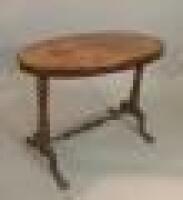 A Victorian walnut and marquetry centre table