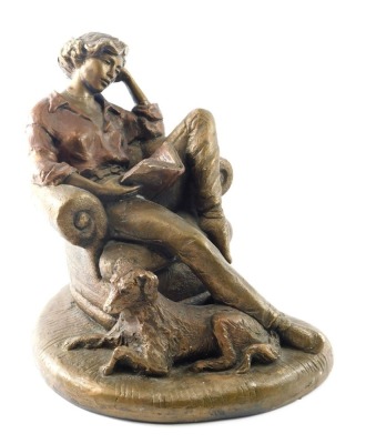 A gilt composition sculpture, modelled in the form of a lady seated on an armchair, 28cm wide.