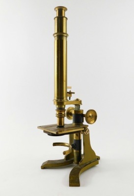 A brass microscope, 38cm high, and various accessories. - 2