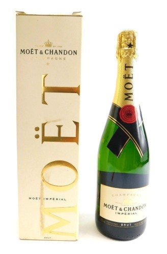 A bottle of Moët et Chandon Imperial Champagne, in original box and packaging.