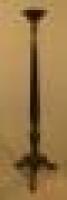 A mahogany torchere