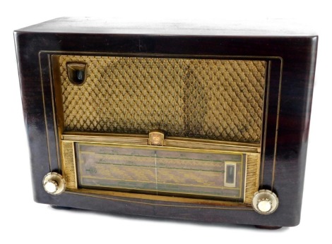 A Phillips valve radio, in walnut case, 50cm wide.