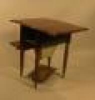 A 19thC Continental mahogany drop leaf work table