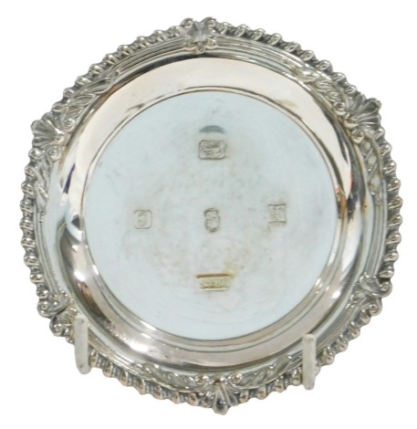 A Queen Elizabeth Jubilee pin tray, with gadrooned and shell cast border, Birmingham 1977, 1.26oz, 9.5cm diameter.