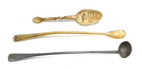 A Persian double end engraved spoon, a 19thC pewter ladle, and a long handled horn spoon. (3)