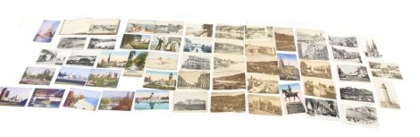 A quantity of early 20thC postcards, to include real photos, etc.