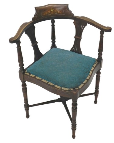 An Edwardian mahogany and marquetry corner chair, with pierced splats, padded seat, on turned legs.