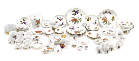 Royal Worcester Evesham pattern wares, comprising tureen and cover, teapot, dinner plates, ramekins, flan dishes, butter knives, etc. (a quantity)