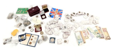 A large quantity of coins, to include silver Pobjoy Mint silver fifty pence, some silver crowns, part silver and cupronickel coins, foreign coins, etc.