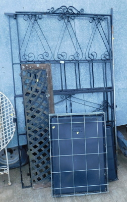 A pair of wrought iron gates, each 170cm high, 103cm wide, two dog crates, etc. Buyer Note: VAT is payable on the hammer price of this lot