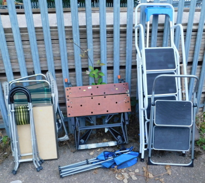 A Black and Decker Workmate, various garden seats, step ladder, tools, etc.