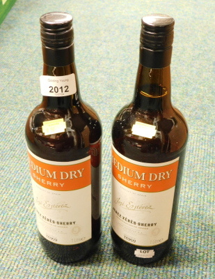 Two bottles of Jose Estevez medium dry sherry, 1 litre.